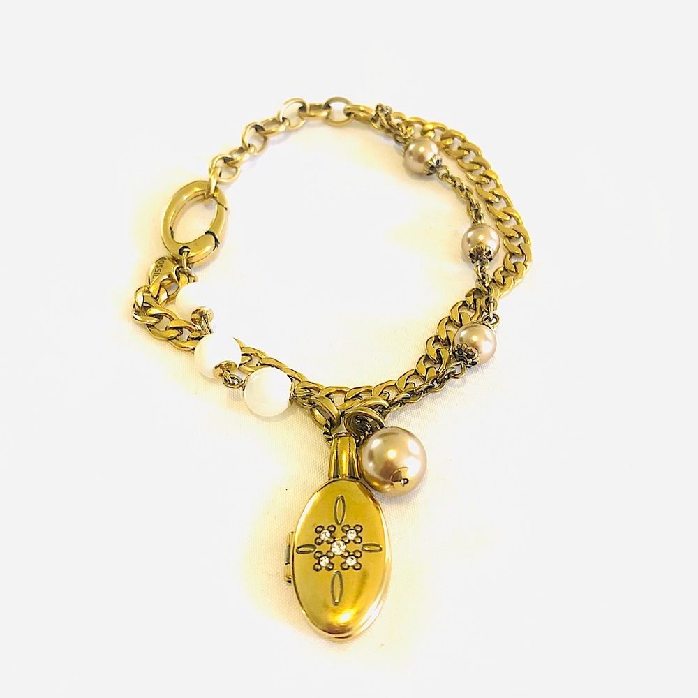 Fossil bracelet & locket with other nice details